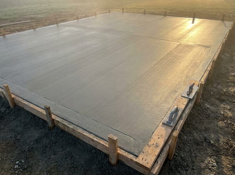 Finisher working fresh concrete